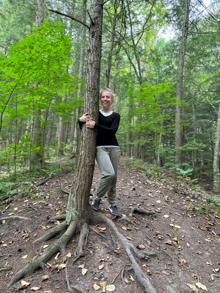 Sarah Richardson standing in the forest